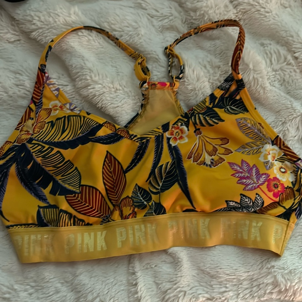 PINK sports bra.  Yellow/Orange leaf pattern.